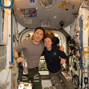 NASA astronauts Jonny Kim and Zena Cardman pose for a portrait in the Unity module
